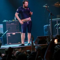 say anything live review - reggie sexy cop