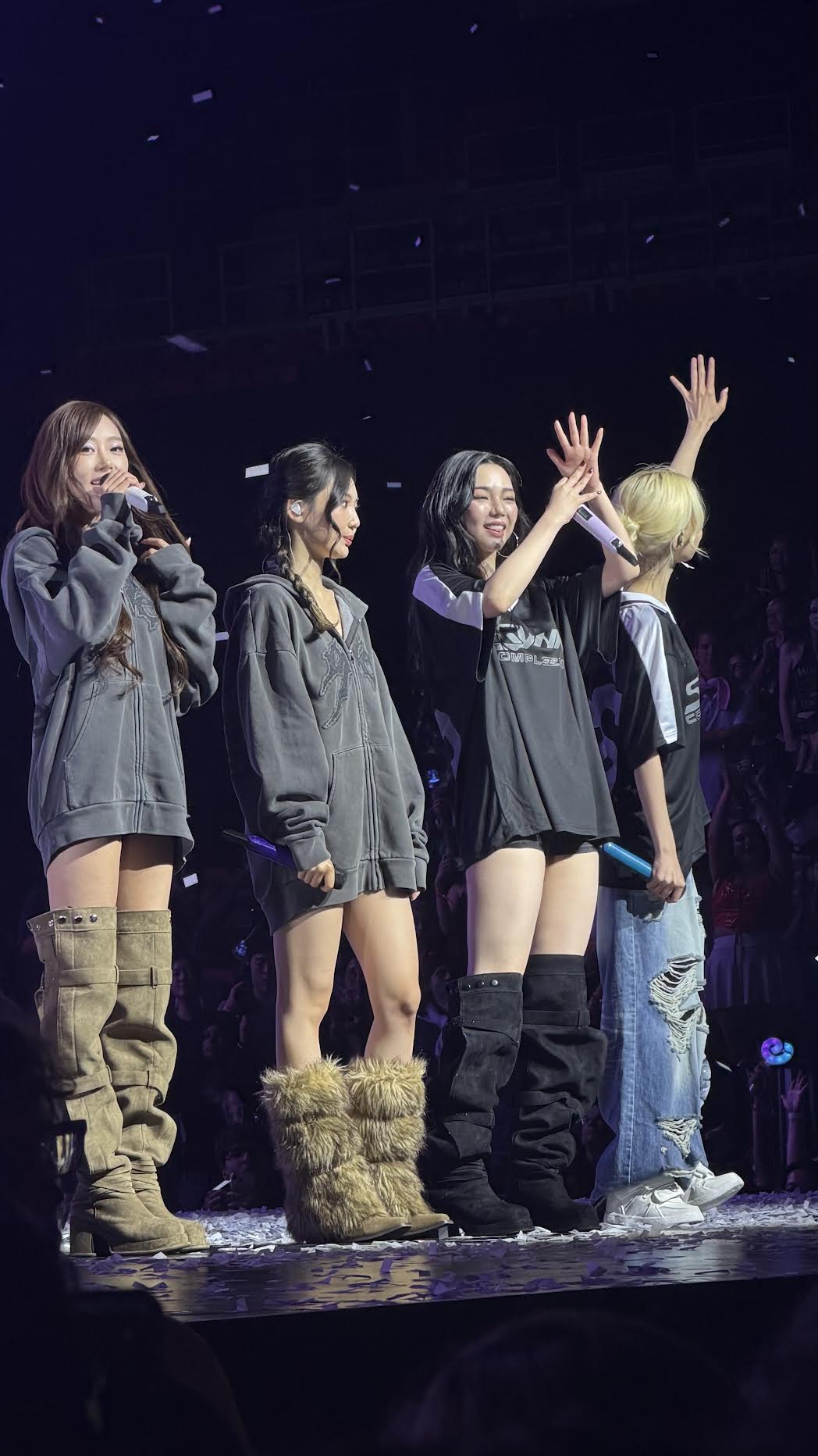aespa wave to the audience at Kaseya Center